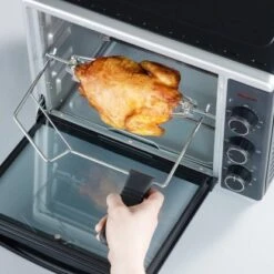 Severin Mini Backofen 1600 W, 230°C 8 Severin Mini Backofen 1600 W, 230°C -Küchenutensilien Angebote 056 Haehnchen herausnehmen